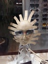 Close up view of mannequin with various fashionable sunglass in shop