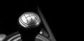 Close up view of a manual gear lever shift isolated on black background. Manual gearbox. Car interior details. Car transmission. S Royalty Free Stock Photo