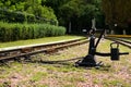 Close-up view of manual railroad switch. Black railroad direction switch. Kyiv Children`s Railway in Syretsky Park. Royalty Free Stock Photo