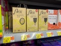 Monroe, WA USA - circa December 2022: Close up view of menstrual cups for sale inside a Walmart retail store