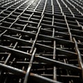A close-up view of a metal grid structure composed of intersecting bars, creating a pattern of Royalty Free Stock Photo