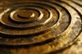 A close up view of a metal object with a circular design. This image can be used in various contexts Royalty Free Stock Photo