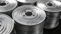 Closeup View of Metallic Thread Spools Stacked Neatly in a Creative Workshop Environment Royalty Free Stock Photo