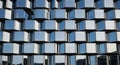 Modern Architectural Facade with Reflective Hexagonal Glass Panels and Metallic Frames Creating a Geometric Pattern Royalty Free Stock Photo