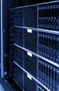 Close up view of modern computer server in dark tinting design. Networking, big data centre and high technology concept Royalty Free Stock Photo