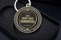 Close up view of 100 percent Money back guaranteed badge with copy space