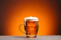 close up view of mug of cold beer on orange backdrop Royalty Free Stock Photo