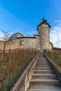 Close up view of the Munot fortification surrounded by vineyard in center of Schaffhausen city center on sunny day in autumn with Royalty Free Stock Photo