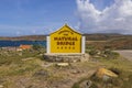 Close-up view of Natural Bridge of Aruba sign on nature landscape background Royalty Free Stock Photo