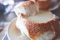 Close up view of New England Clam chowder in bread, traditional american soup with clam and broth, California Royalty Free Stock Photo