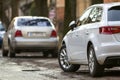 Close-up view of a new modern car parked on the side of the street Royalty Free Stock Photo