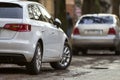 Close-up view of a new modern car parked on the side of the street Royalty Free Stock Photo