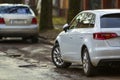 Close-up view of a new modern car parked on the side of the street Royalty Free Stock Photo