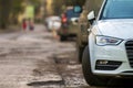 Close-up view of a new modern car parked on the side of the street Royalty Free Stock Photo