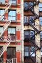 Close-up view of New York City apartment buildings with emergency stairs in Little Italy neighborhood of Manhattan NYC Royalty Free Stock Photo