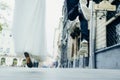 Close-up view of the newlyweds legs in the air. Jumping couple in the street. No face.