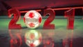 Close up view of 2021 number. Red text and soccer balls on the green reflective ground. Happy new year.