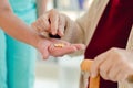 Nurse giving pills to woman patient Royalty Free Stock Photo