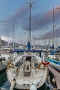 Close up view of the Ocean Village Marina with lots of yachts, tourist boats moored to the waterfront in Gibraltar.