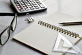 Close-up view office table, Creative writing for free time with silver pencil, ruler, glasses and calculator is elements.