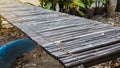 A close-up view of an old bamboo bridge screwed down Royalty Free Stock Photo