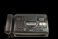 Close up view of old Panasonic fax phone isolated on black background. Royalty Free Stock Photo