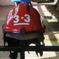 Close-up view of old red fire helmet. 911 concept Royalty Free Stock Photo