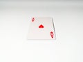 A close up view at one ace card with a heart suit from a deck of playing cards. The concept of games, gambling, fun and free time