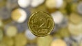 Close-up view of one 20 euro cent coin. This is money. Blurred money background. Eurozone changeable coin with a value of 0.2 Royalty Free Stock Photo