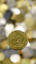 Close-up view of one 20 euro cent coin. This is money. Blurred money background. Eurozone changeable coin with a value of 0.2 Royalty Free Stock Photo