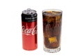 Close up view of open cocs can and soda with ice in crystal glass. Drink concept. Royalty Free Stock Photo