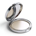 Elegant silver compact powder case with a mirrored lid, expertly created as an AI-generated image Royalty Free Stock Photo
