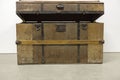 Close up view of an opened antique chest on white background. The concept of industrial old equipment