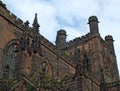 Close up view of ornate medieval stonework and tower on the historic chester cathedral