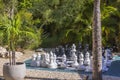 Close up view of outdoor activities for hotel guests playing big chess. Royalty Free Stock Photo