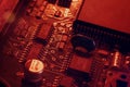 Close-up view over an emergency red microcircuit for an emergency. Circuit board PCB and electronic chip components Royalty Free Stock Photo