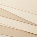 Close-up view of overlapping sheets of beige paper with a smooth texture. The sheets Royalty Free Stock Photo