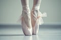 close up view of a pair of ballet shoes with a pink skirt on it Royalty Free Stock Photo