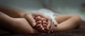 Close up view of parent hands holding tiny feet newborn baby Royalty Free Stock Photo