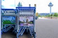 Close up view of parked airport trolleys; advertising space Royalty Free Stock Photo
