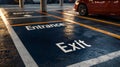 Close-Up View of Parking Structure Signage with Clearly Marked Entrance and Exit Points for Effective Traffic Flow Management Royalty Free Stock Photo