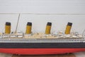 Close up view of part of wooden Titanic ship model.