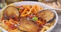 Close up view of pasta spaghetti, linguine with tomato sauce and aubergines Royalty Free Stock Photo