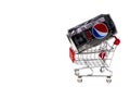 Close up view of pepsi cola can in shopping cart on white background isolated.