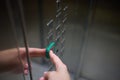 A video displaying a closeup view of someone pushing elevator buttons in an office building Royalty Free Stock Photo