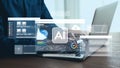 Close-Up View of a Person Using a Laptop to Explore Artificial Intelligence Technologies with Data Visualizations and Royalty Free Stock Photo