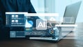 Close-Up View of a Person Using a Laptop to Explore Artificial Intelligence Technologies with Data Visualizations and Royalty Free Stock Photo