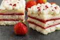 Close up view of piece of strawberry cheescake