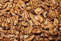 Close-up view of a pile of walnuts showcasing their texture and brown color. Royalty Free Stock Photo