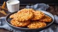 Close-up view of a plate with delicious golden brown oatmeal cookies Royalty Free Stock Photo